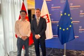 Okolicznościowe zdjęcie w Ambasadzie Rzeczypospolitej Polskiej w Pekinie z dr Gao Min z Inner Mongolia University w Hohhot